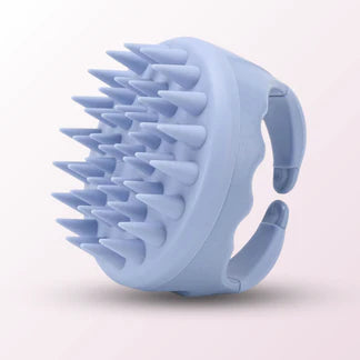 Brosse de massage pour la douche